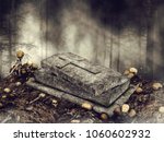 Dark scene with an open coffin surrounded by skulls and bones in the woods. 3D illustration.