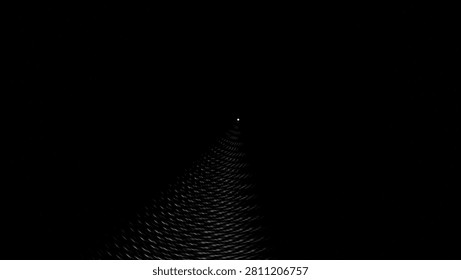 A dark scene showing a small light point at the end of a long tunnel. The walls appear textured, creating a sense of depth and distance. The environment feels mysterious and intriguing.