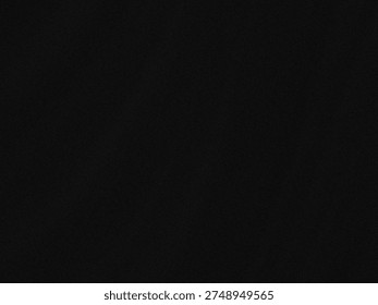 A dark and seemingly endless void with subtle grainy texture