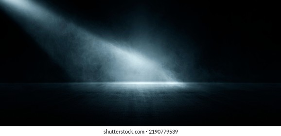 The dark stage shows, dark blue background, an empty dark scene, neon light, and spotlights The concrete floor and studio room with smoke float up the interior texture for display products - Shutterstock ID 2190779539