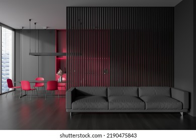 Dark Studio Interior With Sofa And Dining Area, Panoramic Window On Singapore City View. Cooking Zone With Red Kitchen Appliances And Relax Space, Black Hardwood Floor. Copy Space Wall. 3D Rendering