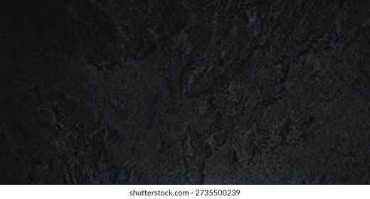 Dark textured stone wall with subtle green highlights creates an abstract moody background high quality professional