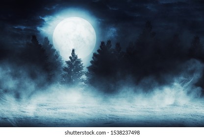 Dark winter forest background at night. Silhouettes of trees on a background of the moon, snow, fog. - Powered by Shutterstock