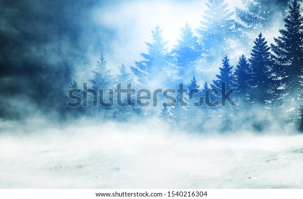 Dark winter forest background at\
night. Snow, fog, moonlight. Neon figure in the\
center