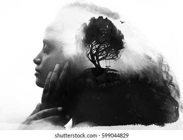 Dark-skinned female's portrait combined with a dreamy painting of a symbolic tree, swing, and flying bird

 - Powered by Shutterstock