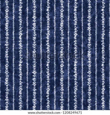 Dashed Ethnic Stripes Indigo-Dyed Effect Textured Background. Seamless Pattern.