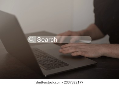 Data Search Technology SEO Search Engine Optimization concept. Man's hands typing on laptop computer keyboard surfing the internet to search for information on web browser.