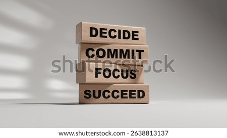 Decide Commit Focus Succeed symbol. Concept words Decide Commit Focus Succeed on wooden blocks.Business concept. Copy space.3D rendering on white background.
