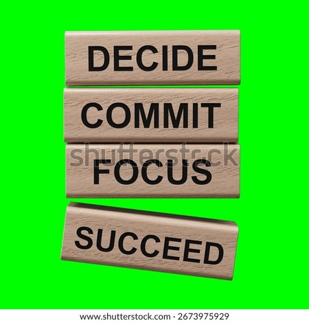 Decide Commit Focus Succeed symbol. Concept words Decide Commit Focus Succeed on wooden blocks.Business concept. Copy space.3D rendering on Green Screen for footage and clipping path.
