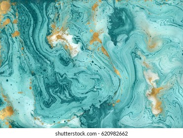 Decorative marble texture. Abstract painting, can be used as a trendy background for wallpapers, posters, cards, invitations, websites. Turquoise and golden paints on a white paper. Contemporary art.
