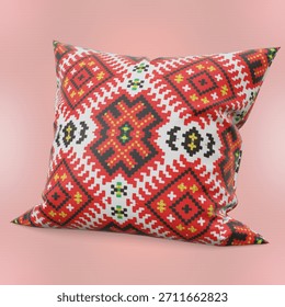 a decorative pillow featuring ethnic patterns in red, white, black, and yellow on a pink background