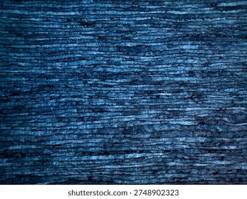 Deep blue textured background with horizontal stripes and natural wooden grain surface professional backdrop with dark navy and indigo colors