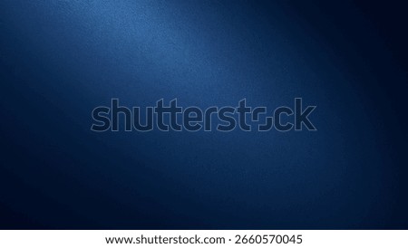 A deep, dark blue background with a subtle texture and a soft light source illuminating a portion of the surface. The gradient eff