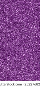 Deep purple glitter texture with shimmering, densely packed particles. It has hints of pink and blue, creating a dazzling metallic effect, evoking glamour, festivity, and luxurious vibes.