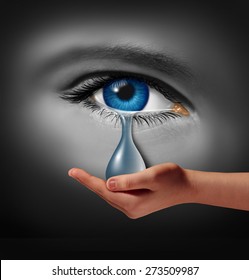 Depression support and therapy concept as a depressed human eye crying a tear held by a helping hand as a metaphor for solutions in the the treatment of mental health or psychotherapy medication.