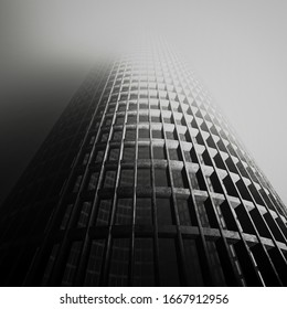 design element. 3d illustration. rendering. abandoned conrete skyscraper in gray fog black and white