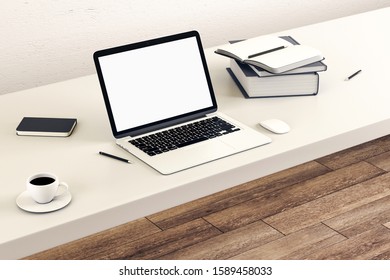 Designer desktop with empty laptop screen, coffee cup and supplies. Mock up, 3D Rendering