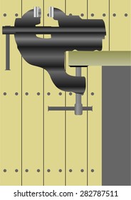 Device for clamping  workpieces in the workshop a background of boarded walls.