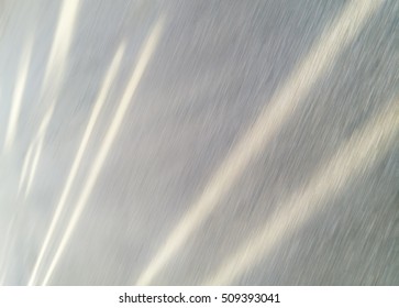 Diagonal light lines on ground background