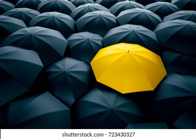 Different, unique and standing out of the crowd yellow umbrella