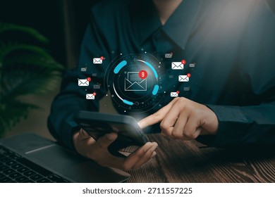 Digital communication concept, hand checking smartphone with email alert icons, workflow messaging management, timely response efficiency, productivity enhancement, corporate communication clarity.