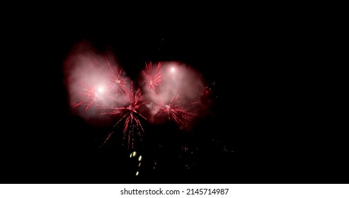 Digital Image Of Red Fireworks Exploding Against Black Background. 4k