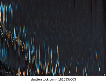 Digital Noise Overlay. Defect Texture. Blue Orange Glitch Artifacts With Dust On Black Background.