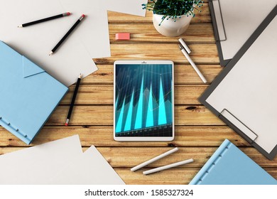 Digital tablet closeup top view with financial graph on screen. Online trading application concept. 3d rendering.