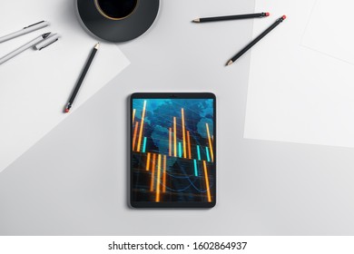 Digital tablet closeup top view with financial graph and partial world map on screen. Online international trading application concept. 3d rendering.