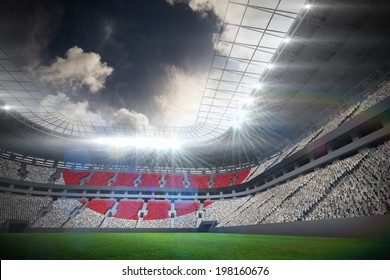 Digitally Generated Japan National Flag Against Football Stadium With Fans In White