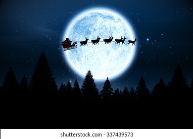 Digitally Generated Santa Flying Over Night Sky