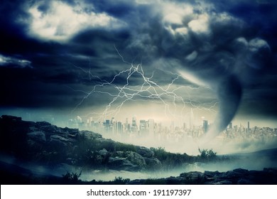 Digitally generated stormy sky with tornado over cityscape