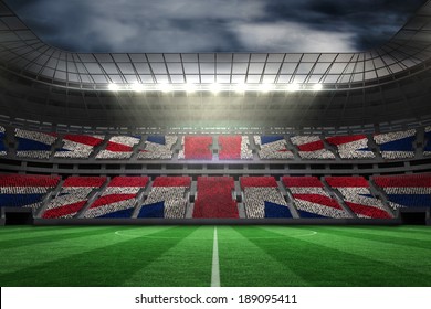 Digitally Generated Uk National Flag Against Large Football Stadium