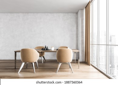 Dining Room With Four Beige Chairs, Table With Dishes On Wooden Floor, Near Window With City View. Living Room With Eating Table And Furniture, 3D Rendering No People