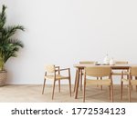 Dining room wall mock up with Areca palm,  dining set, wooden table on wooden floor. 3d illustration.