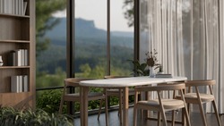 A Dining Table In A Modern, Luxury Living Room Or Dining Room With A Large Window With An Amazing Mountain View. 3d Render, 3d Illustration
