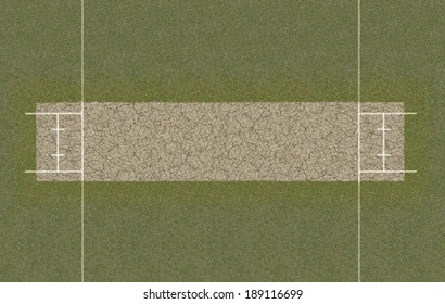 A direct top view of the layout of a cricket pitch set up on grass