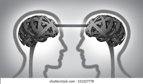 Direction communication business concept for building a bridge between two team members with human heads and brain made from tangled roads and highways connected with a street for agreement success.