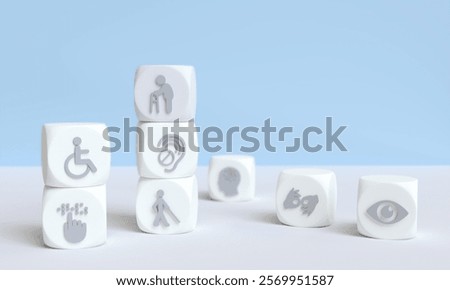 Disability icons on square cubes with copy space. 3D Rendering.