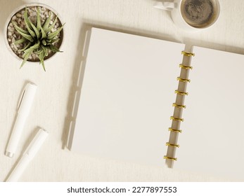 Disc bound notebook mockup showing open blank notebook spread with copy and design presentation space. White stationery. Top view of a flat lay on a desk. Realistic 3D render. - Powered by Shutterstock