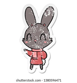 Distressed Sticker Of A Cute Cartoon Rabbit Wearing Clothes