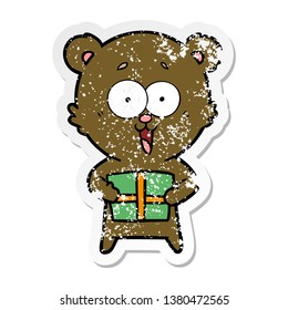 distressed sticker laughing teddy  bear and christmas present