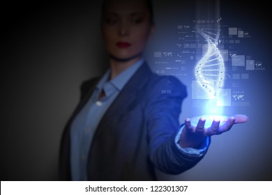 DNA science background with business person on the background - Powered by Shutterstock