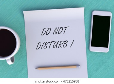 DO NOT DISTURB, Message On Paper, Smart Phone And Coffee On Table, 3D Rendering