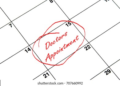 Doctors Appointment Circled On A Calendar In Red