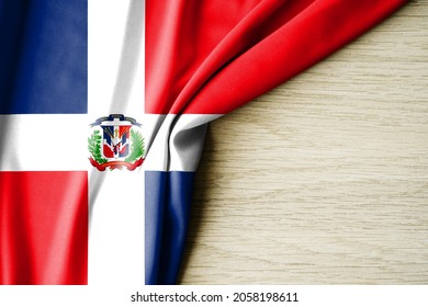 Dominican Republic flag. Fabric pattern flag of Dominican Republic. 3d illustration. with back space for text. Close-up view.