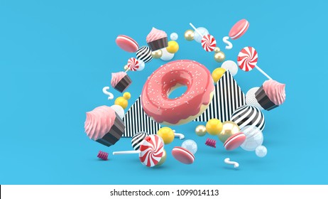 Donut ,Cupcakes ,Macaron,Candy floating among colorful balls on a blue background.-3d render. - Powered by Shutterstock