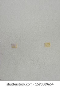 old​ wall​ and​ old​ double-sided adhesive tape background 