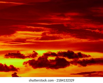 Dramatic fiery cloudscape at sunset in summer, southwest Florida. Digital painting effect, 3D rendering.