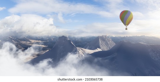 Dramatic Mountain Landscape covered in clouds and Hot Air Balloon Flying. 3d Rendering Adventure Dream Concept Artwork. Aerial Image from British Columbia, Canada. Cloudy Sky